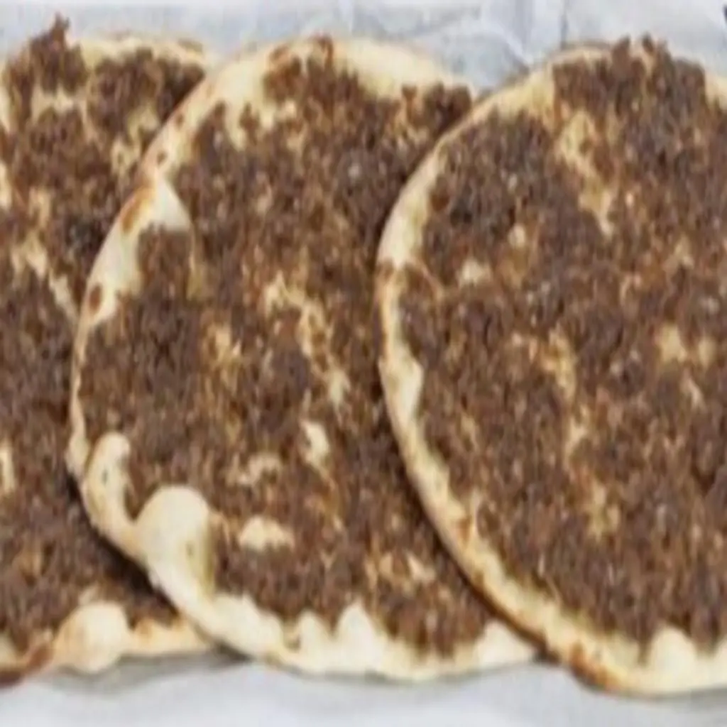 لحم بعجين بدبس الرمان